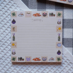 Bloc-notes "Patchwork chat cosy" par chatdudesert. Photo prise de face, vue d'ensemble sur le bloc-notes.