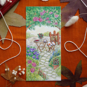 Reproduction de l'aquarelle "Repos à l'ombre des rosiers" par chatdudesert. Photo prise de face, vue d'ensemble sur l'illustration.
